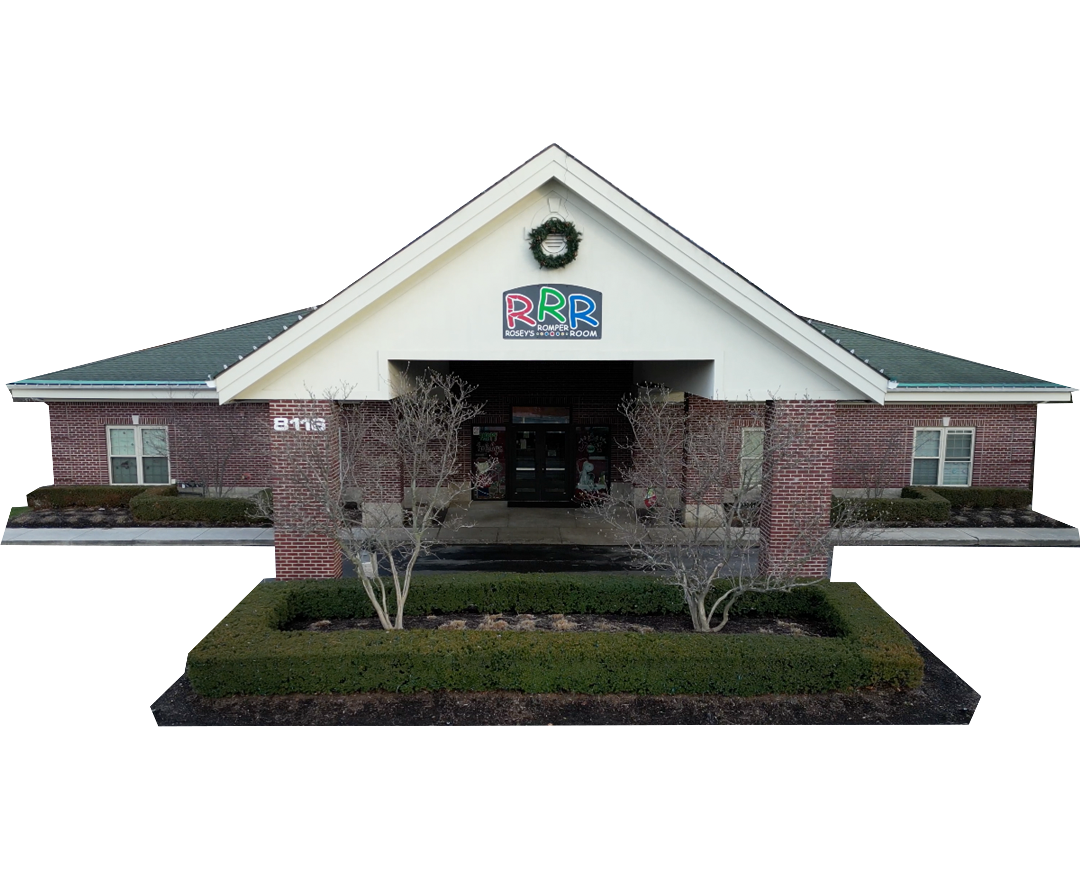 Outside view of the facility featuring modern play areas and dedicated staff members at Rosey's Romper Room.